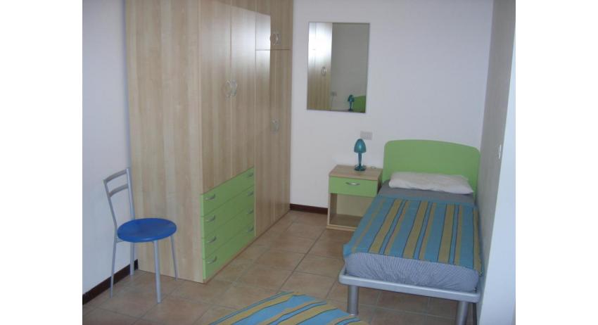 résidence GIRASOLI: C7 - chambre avec deux lits (exemple)