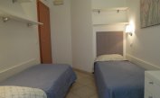 résidence TULIPANO: C6 - chambre avec deux lits (exemple)