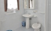 apartments LAGUNA GRANDE: A3 - bathroom with a shower enclosure (example)